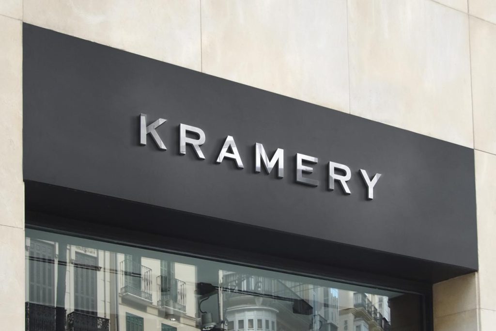 Outdoor signage featuring raised 3D lettering on a modern commercial storefront in Dubai, showcasing professional signage fabrication and premium finishes.